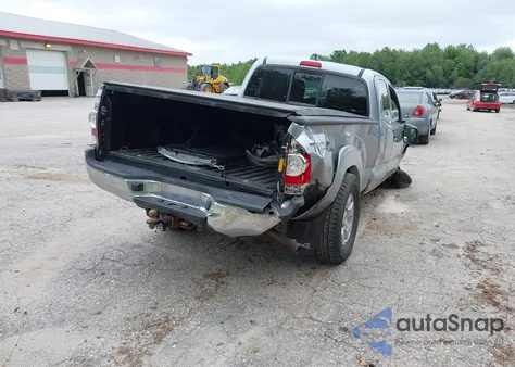 2014 Toyota Tacoma Base V6 z USA, uszkodzony, nr VIN 5TFUU4EN4EX087353